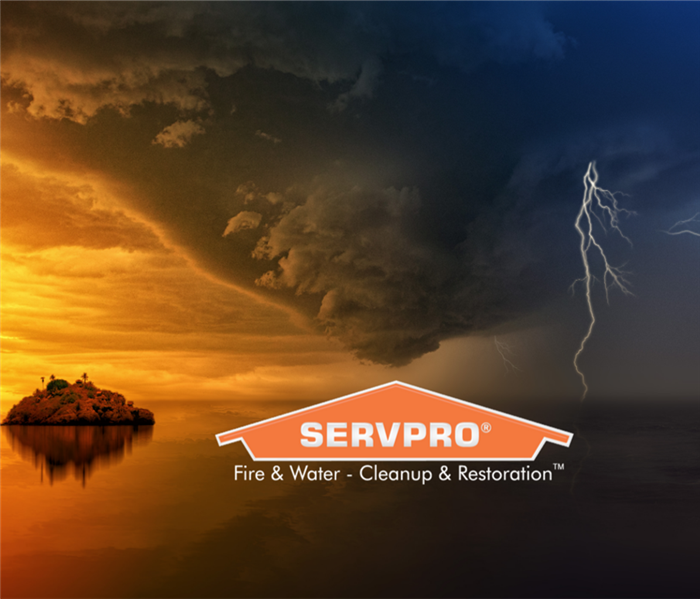 SERVPRO log with storm in background